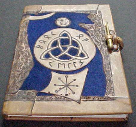 Image of book of shadows celtic design, with runic symbols avail in brown or black leather with red or blue velvet insert order code bos 03 (a5 $88.00) (a4 $132.00).jpg